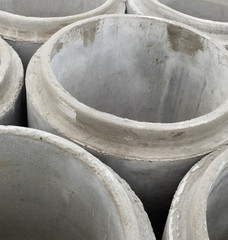 Stack of new concrete pipes.