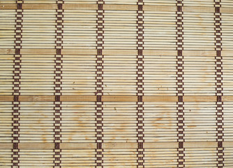 Bamboo mat on the wood table napkin on a wooden board home decor and comfort