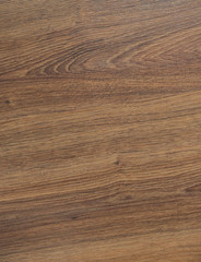 Wooden brown textured floor or desk background and texture of Walnut wood decorative furniture surface