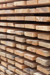 Wooden planks. Air-drying timber stack.