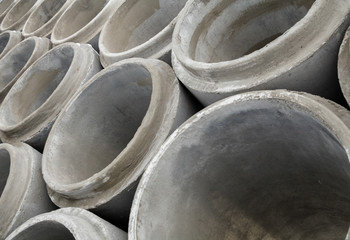 Stack of new concrete pipes.