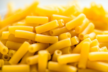 raw italian macaroni pasta close up view