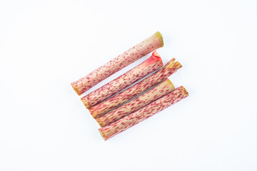 Sour tube rods with fresh wild herbs on white background