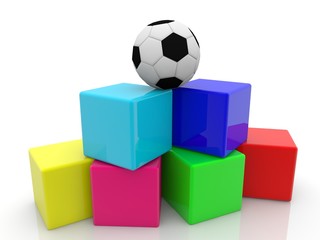 Colorful toy blocks with a soccer ball on top