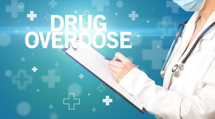 doctor writes notes on the clipboard with DRUG OVERDOSE inscription, first aid concept