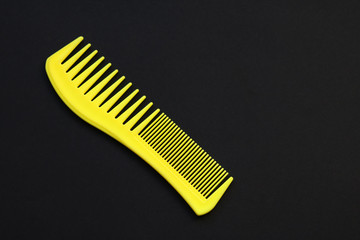 hairbrush on a black background