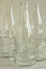 Glass bottles and jars, washed and clean, are ready to be recycled. Garbage for recycling. Glass for recycling