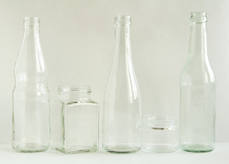 Glass bottles and jars, washed and clean, are ready to be recycled. Garbage for recycling. Glass for recycling