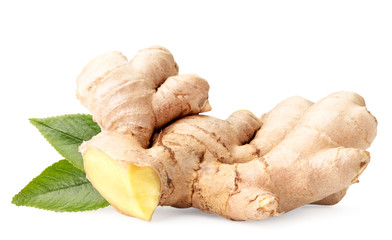 Ginger root with leaves close-up on a white background.