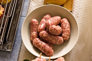 Italian sausages in a white dish (Pesaro, Italy, Europe)
