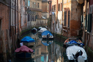 Boats in the canal of Venice