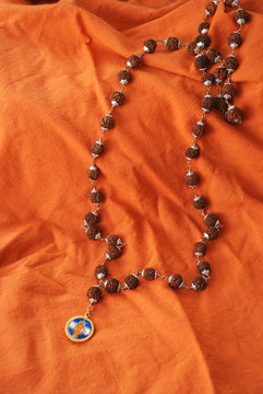 Rudraksha necklace on saffron cloth