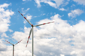 Wind generator against the sky in Austria. The wind generates electricity for us. The blades of a large propeller.