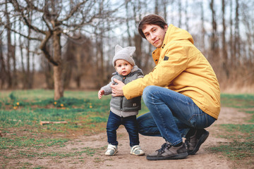 a man takes his child to kindergarten