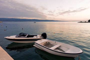 Boats at harbor in Adriatic Sea in Omis at sunset