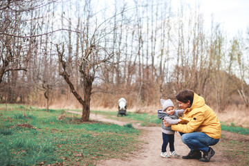 Fototapeta premium a man takes his child to kindergarten