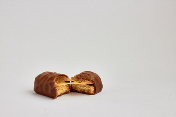 small chocolate bar on white background