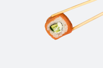Philadelphia roll on a white background, isolated. Close-up