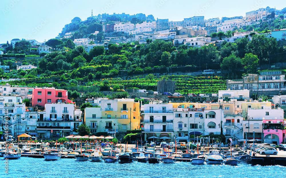 Wall mural harbor of capri island with boats reflex