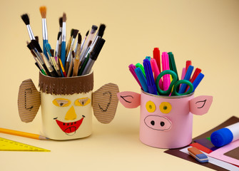 Step 31. Step-by-step instructions on how to make a stand for stationery from recycled materials....