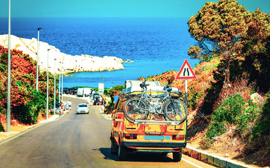 Camper in road Capo Testa in Santa Teresa Gallura Sardinia reflex