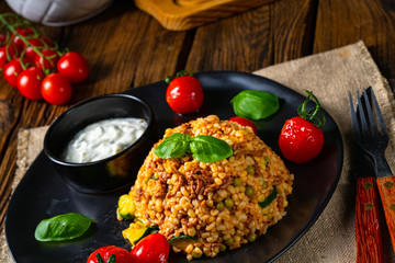 rustic bulgur fried with minced meat and vegetables