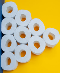 icon play from rolls of toilet paper on a colored background