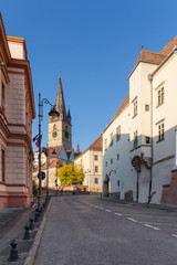 Lutheran Church with iconic bell tower in Sibiu on a beautiful sunny afternoon - 345103709