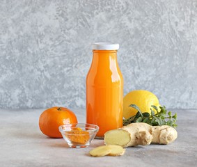 Ginger shot with citrus fruits juice, turmeric and honey. Pure vegan Immunity system booster. Copy...