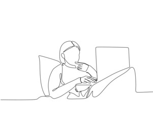 A woman working from her home using a laptop while lying on the bed. Continuous one line drawing vector 