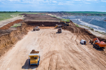 Big quarry, stone mining, equipment for working in quarries, aerial view.