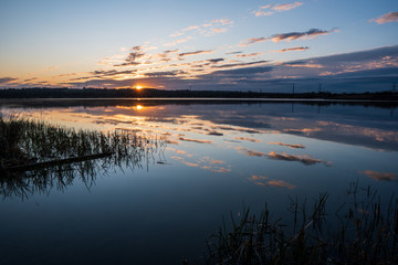 morning lake with sunrise and cloud reflection, czech karvina
