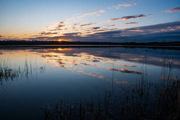 morning lake with sunrise and cloud reflection, czech karvina