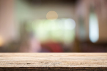 Desk space and blurred of restaurant background. for product display montage. business presentation.