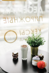 banana milkshake with chocolate chips and plush cakes