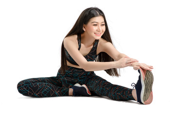 Beautiful Asian women are warming up before doing exercise and yoga. Photo of asian girl by isolated white background. Fitness and healthy lifestyle concept.