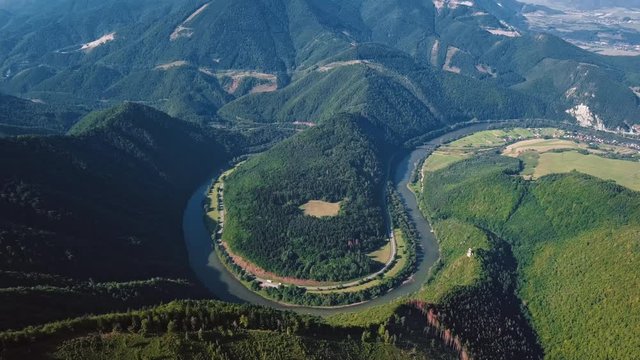 Aerial view of Domasinsky meander river bend on the Vag river, near Zilina, Slovakia