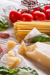 concept of traditional italian pasta with tomatoes and basil