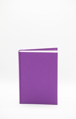 Purple book  is standing on white background. Poems.