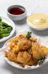 Fried small cheese mozzarella balls breaded in panko