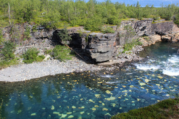 Kungsleden river in the arctic tundra. Abisko national park, Nothern Sweden