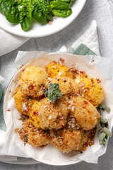 Fried small cheese mozzarella balls breaded in panko