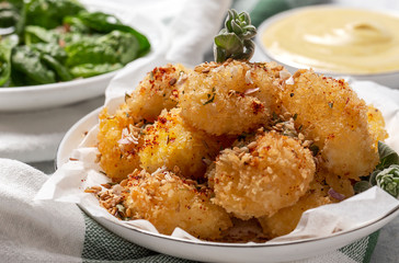 Fried small cheese mozzarella balls breaded in panko