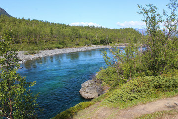 Kungsleden river in the arctic tundra. Abisko national park, Nothern Sweden