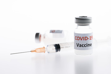 Coronavirus, covid-19 vaccine vial injection on white background