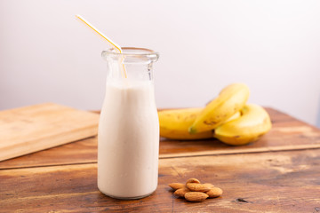 Banana smoothie with almonds. Energizing smoothie ideal for snack before or after a workout.