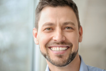 Obraz premium Portrait of handsome businessman in office