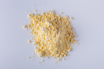 natural corn flour on white acrylic background