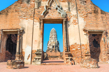 Brick wall and remains of Wat Mahathat temple. Historical and religious architecture of Thailand - ruins of old Siam capital Ayutthaya