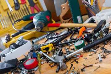 Table littered with various construction tools